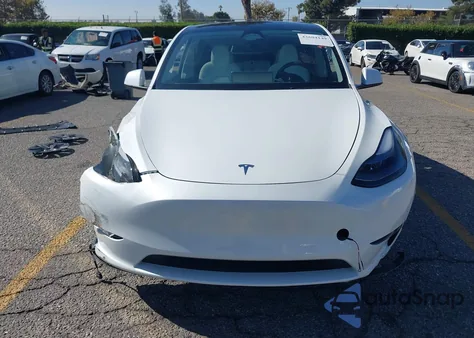 2025 Tesla Model Y Long Range Dual Motor Rear-Wheel Drive from USA, damaged, VIN 7SAYGDED2SF228123